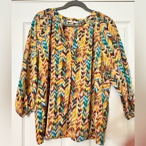 Sioni top with pretty colors! Goes great with tourquoise jewelry!